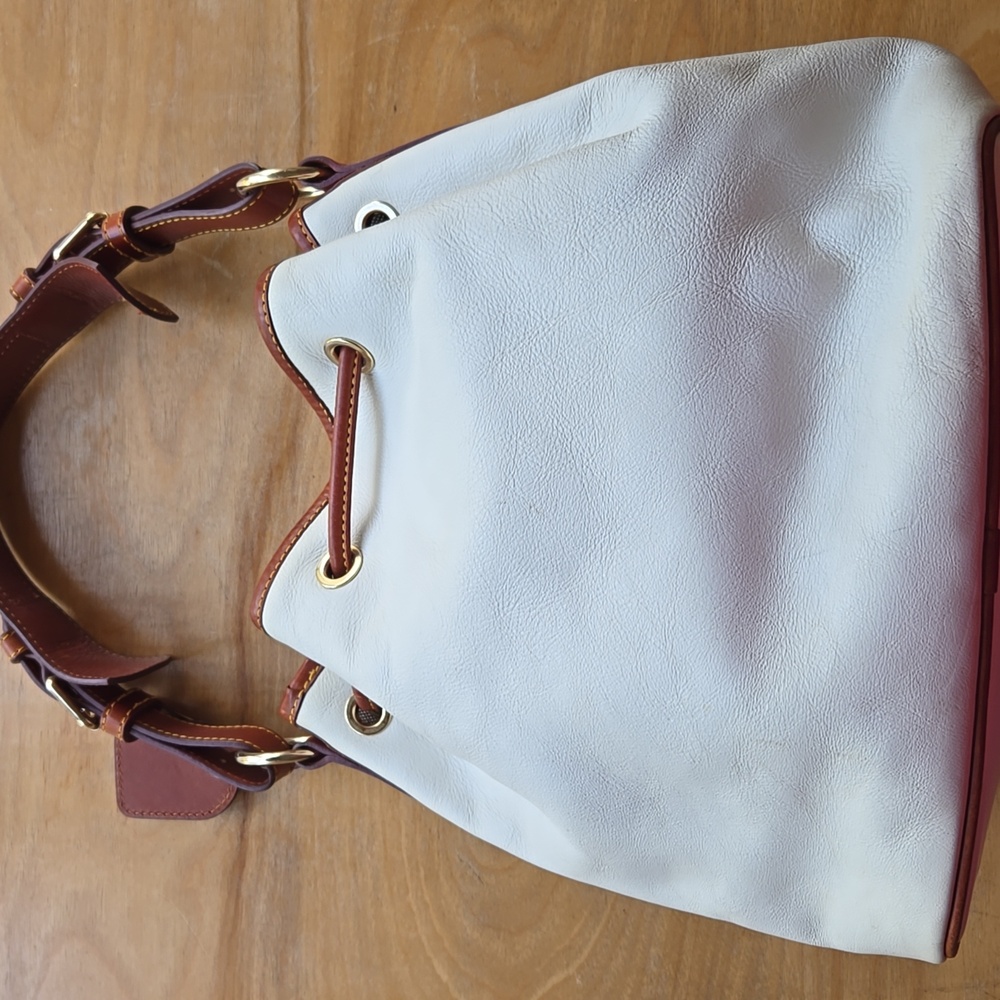 Dooney & Bourke White and Tan Leather Drawstring Bucket Bag - Picture 2 of 7